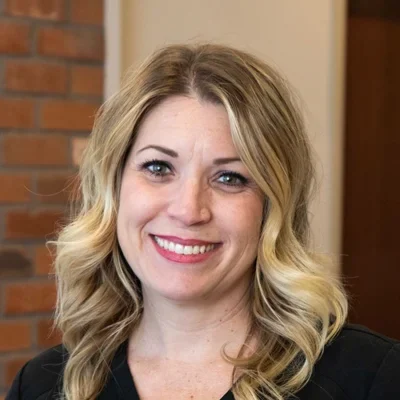 A headshot photo of Sara, a staff member at Matthew Jones Orthodontics